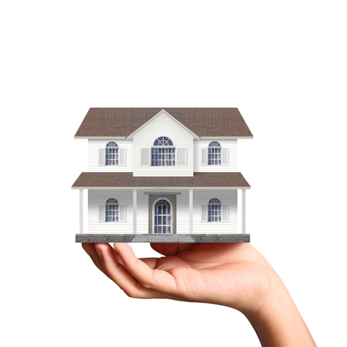 Hand holding a shrunken house in front of white background